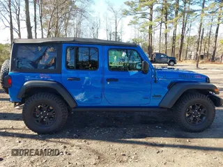 2021 Jeep Wrangler Unlimited Sport S with VIN 1C4HJXDG1MW722743, listed as a IAAI auction lot 41237900 with 35,662 mi miles and . Bid and sale history available at DreamBid. Image 13.