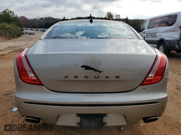 2014 Jaguar XJ with VIN SAJWA1CZ5E8V71971, listed as a Copart auction lot 82116114 with 127,164 mi miles and Salvage Title. Bid and sale history available at DreamBid. Image 6.