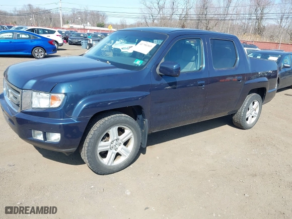 2011 Honda Ridgeline RTL with VIN 5FPYK1F51BB011686, listed as a IAAI auction lot 41790303 with 110,648 mi miles. Bid and sale history available at carsss.com. Image 2.