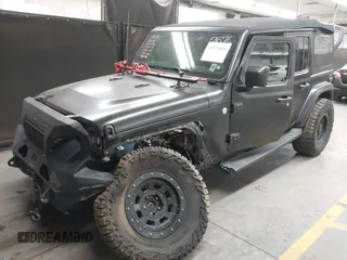 2018 Jeep Wrangler Unlimited Sahara z VIN 1C4HJXEN6JW294774, wystawiony jako IAAI lot #41573606 z przebiegiem 49 325 mil mil oraz . Historia ofert i sprzedaży dostępna na DreamBid. Obrazek 18.