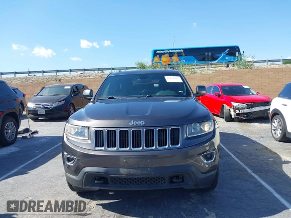 2016 Jeep Grand Cherokee Laredo z VIN 1C4RJFAG5GC390413, wystawiony jako IAAI lot #42254165 z przebiegiem 99 231 mil mil oraz . Historia ofert i sprzedaży dostępna na DreamBid. Obrazek 12.