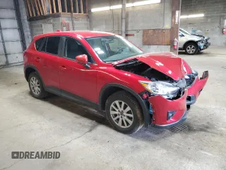 2015 Mazda CX-5 Touring with VIN JM3KE4CY0F0447480, listed as a Copart auction lot 53031845 with 70,724 mi miles and Salvage Title. Bid and sale history available at carsss.com. Image 4.