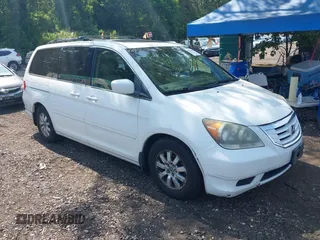 2010 Honda Odyssey EX-L z VIN 5FNRL3H73AB097571, wystawiony jako IAAI lot #42638971 z przebiegiem 149 272 mil mil oraz . Historia ofert i sprzedaży dostępna na DreamBid. Obrazek 1.