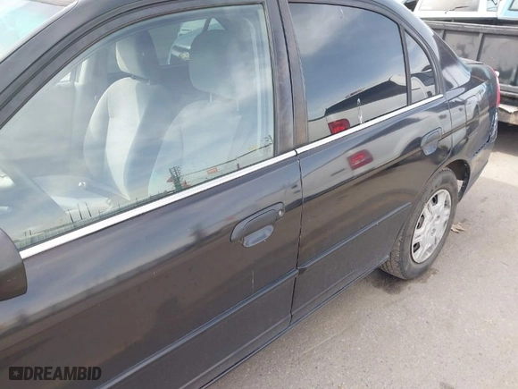 2001 Honda Civic LX with VIN 2HGES16571H531350, listed as a IAAI auction lot 41576138 with 242,066 mi miles. Bid and sale history available at carsss.com. Image 16.