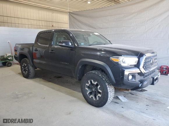 2019 Toyota Tacoma 4WD SR with VIN 5TFCZ5AN5KX185683, listed as a Copart auction lot 54176255 with 106,524 mi miles and Clean Title. Bid and sale history available at carsss.com. Image 4.