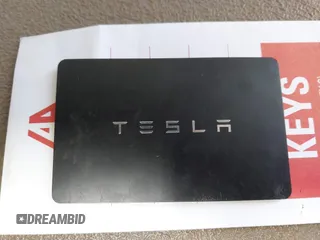 2024 Tesla Model Y Performance with VIN 7SAYGDEFXRF049338, listed as a IAAI auction lot 41240812 with 10,132 mi miles and . Bid and sale history available at DreamBid. Image 11.