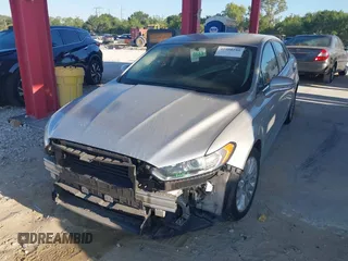 2014 Ford Fusion SE Hybrid with VIN 3FA6P0LU2ER319451, listed as a IAAI auction lot 41998180 with 170,191 mi miles. Bid and sale history available at carsss.com. Image 2.