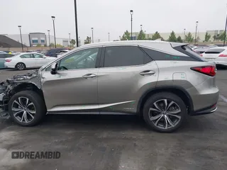 2022 Lexus RX 450h with VIN 2T2HGMDA7NC072735, listed as a IAAI auction lot 42356852 with 62,835 mi miles and . Bid and sale history available at DreamBid. Image 15.