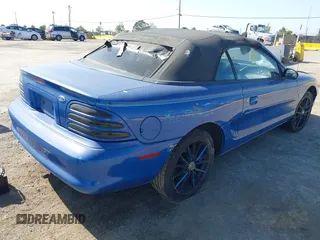 1995 Ford Mustang with VIN 1FALP444XSF180753, listed as a IAAI auction lot 42184136 with 194,084 mi miles and . Bid and sale history available at DreamBid. Image 4.