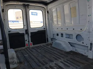 2018 Ford Transit with VIN 1FTYR2CM9JKA52056, listed as a IAAI auction lot 42542981 with 151,835 mi miles and . Bid and sale history available at DreamBid. Image 8.