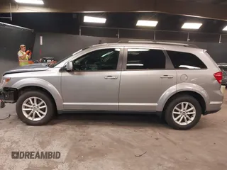 2017 Dodge Journey SXT z VIN 3C4PDCBG8HT589750, wystawiony jako IAAI lot #42286485 z przebiegiem 160 859 mil mil oraz . Historia ofert i sprzedaży dostępna na DreamBid. Obrazek 14.