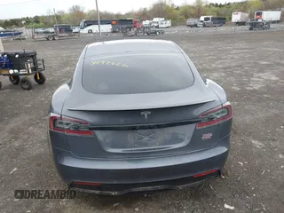 2021 Tesla Model S Long Range with VIN 5YJSA1E5XMF428519, listed as a IAAI auction lot 41926242 with 54,284 mi miles and . Bid and sale history available at DreamBid. Image 16.