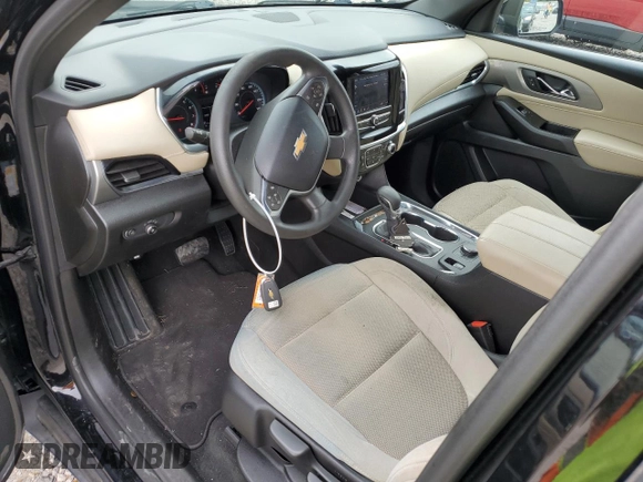 2023 Chevrolet Traverse LS with VIN 1GNERFKW6PJ108991, listed as a Copart auction lot 61252155 with 59,188 mi miles and Salvage title. Bid and sale history available at DreamBid. Image 8.