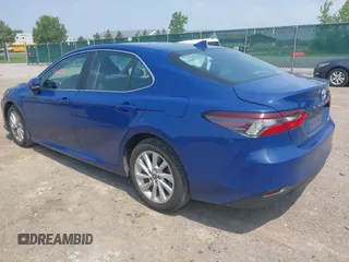 2023 Toyota Camry LE z VIN 4T1R11AK9PU180068, wystawiony jako IAAI lot #42483656 z przebiegiem 59 312 mil mil oraz . Historia ofert i sprzedaży dostępna na DreamBid. Obrazek 3.