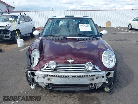 2003 MINI Hardtop with VIN WMWRC33493TC45557, listed as a IAAI auction lot 41868476 with 114,848 mi miles and . Bid and sale history available at DreamBid. Image 13.
