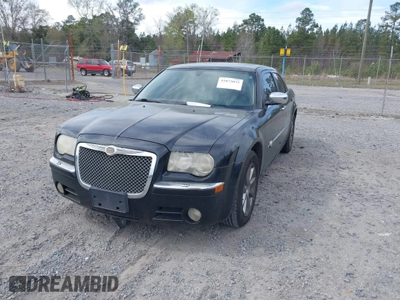 2006 Chrysler 300 C with VIN 2C3KA63H36H455735, listed as a IAAI auction lot 41875033 with 175,251 mi miles. Bid and sale history available at carsss.com. Image 2.