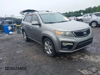 2012 Kia Sorento SX z VIN 5XYKW4A28CG260191, wystawiony jako IAAI lot #42347844 z przebiegiem 207 227 mil mil oraz . Historia ofert i sprzedaży dostępna na DreamBid. Obrazek 1.