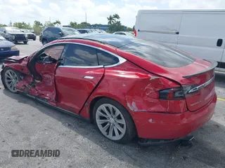 2016 Tesla Model S 70 with VIN 5YJSA1E16GF135833, listed as a IAAI auction lot 42084421 with 97,615 mi miles and . Bid and sale history available at DreamBid. Image 3.