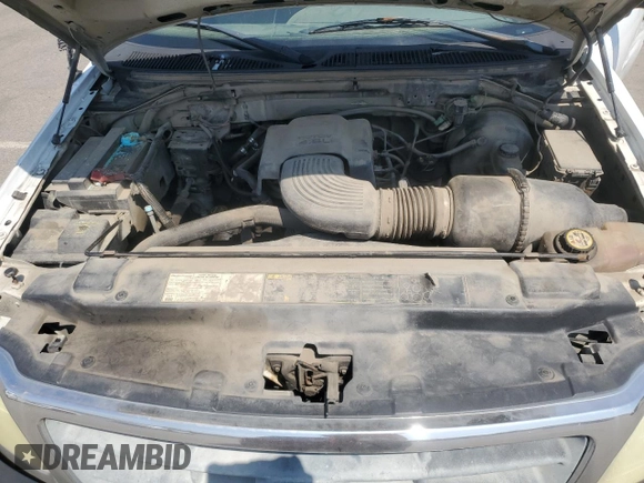 2004 Ford F-150 XL with VIN 2FTRX17W54CA63466, listed as a Copart auction lot 64022895 with 329,377 mi miles and Salvage title. Bid and sale history available at DreamBid. Image 11.