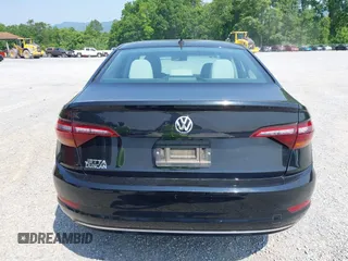 2019 Volkswagen Jetta S z VIN 3VWC57BU6KM084104, wystawiony jako IAAI lot #42423409 z przebiegiem 115 398 mil mil oraz . Historia ofert i sprzedaży dostępna na DreamBid. Obrazek 16.