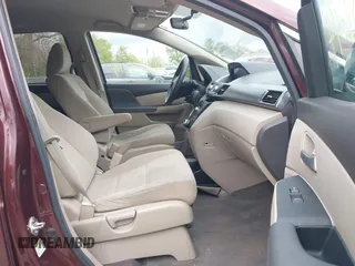 2013 Honda Odyssey LX with VIN 5FNRL5H25DB080209, listed as a IAAI auction lot 42123644 with 157,631 mi miles and . Bid and sale history available at carsss.com. Image 5.