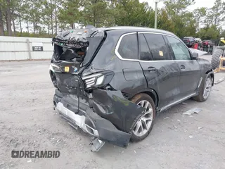 2021 BMW X5 sDrive40i with VIN 5UXCR4C07M9G60674, listed as a IAAI auction lot 38203174 with 1 mi miles. Bid and sale history available at carsss.com. Image 4.
