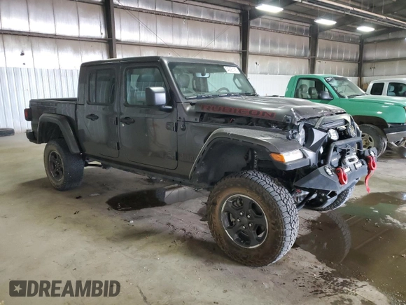 2021 Jeep Gladiator Rubicon with VIN 1C6JJTBG6ML579391, listed as a Copart auction lot 54626145 with 38,847 mi miles and Salvage title. Bid and sale history available at DreamBid. Image 4.