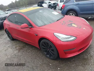 2018 Tesla Model 3 Long Range Battery z VIN 5YJ3E1EB7JF135199, wystawiony jako IAAI lot #41580853 z przebiegiem 131 774 mil mil oraz . Historia ofert i sprzedaży dostępna na DreamBid. Obrazek 1.