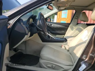 2014 Infiniti Q50 Premium with VIN JN1BV7ARXEM680167, listed as a Copart auction lot 59702095 with 108,196 mi miles and Salvage title. Bid and sale history available at DreamBid. Image 7.