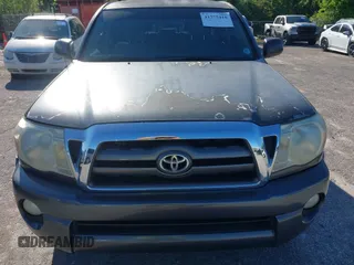 2009 Toyota Tacoma PreRunner with VIN 3TMJU62N59M088137, listed as a IAAI auction lot 41775410 with 217,331 mi miles. Bid and sale history available at carsss.com. Image 12.