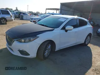 2014 Mazda 3 i Grand Touring with VIN JM1BM1M7XE1102093, listed as a IAAI auction lot 41344433 with 148,395 mi miles and . Bid and sale history available at DreamBid. Image 17.