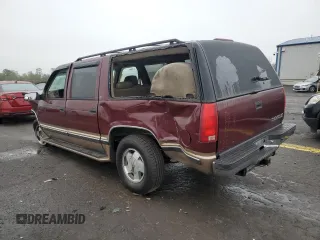 1999 Chevrolet Suburban with VIN 1GNFK16R7XJ402741, listed as a Copart auction lot 73283404 with 143,943 mi miles and Salvage Title. Bid and sale history available at carsss.com. Image 2.