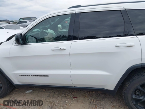 2018 Jeep Grand Cherokee Laredo E with VIN 1C4RJEAG7JC322888, listed as a IAAI auction lot 41756833 with 129,988 mi miles and . Bid and sale history available at DreamBid. Image 14.