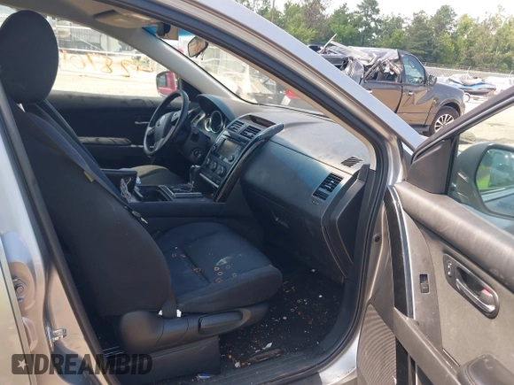 2015 Mazda CX-9 Sport z VIN JM3TB2BA3F0451593, wystawiony jako IAAI lot #42870124 z przebiegiem 196 390 mil mil oraz . Historia ofert i sprzedaży dostępna na DreamBid. Obrazek 5.
