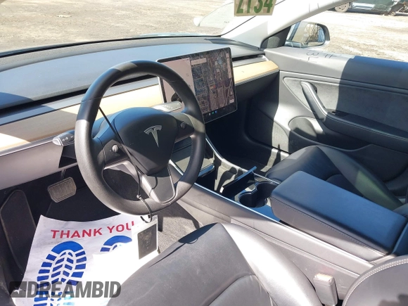 2020 Tesla Model 3 Long Range with VIN 5YJ3E1EB6LF600266, listed as a IAAI auction lot 41819374 with 28,406 mi miles. Bid and sale history available at carsss.com. Image 5.