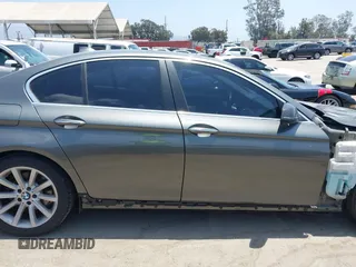 2014 BMW 5 Series 535i xDrive with VIN WBA5B3C57ED531072, listed as a IAAI auction lot 42574991 with 104,304 mi miles and . Bid and sale history available at DreamBid. Image 14.