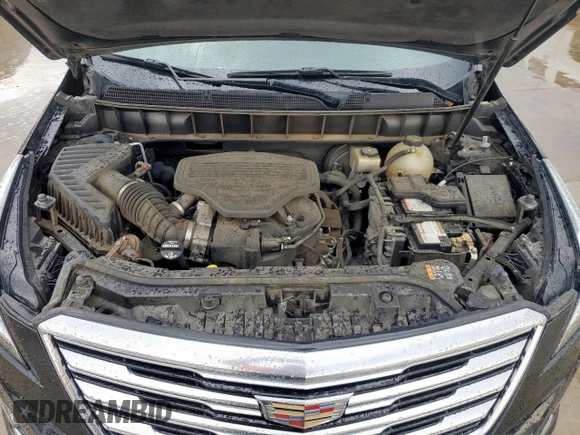 2017 Cadillac XT5 Luxury FWD z VIN 1GYKNBRS9HZ160664, wystawiony jako Copart lot #55856915 z przebiegiem 98 161 mil mil oraz Szkody całkowita. Historia ofert i sprzedaży dostępna na DreamBid. Obrazek 12.