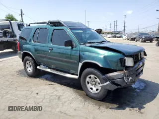 2001 Nissan Xterra XE with VIN 5N1ED28T71C509969, listed as a Copart auction lot 62353085 with 292,763 mi miles and Salvage title. Bid and sale history available at DreamBid. Image 4.