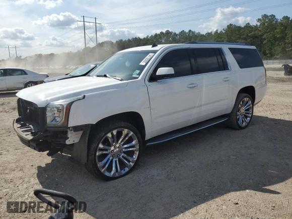 2015 GMC Yukon XL SLE z VIN 1GKS1GKC6FR152038, wystawiony jako Copart lot #54730265 z przebiegiem 142 696 mil mil oraz Szkoda całkowita • Salvage title. Historia ofert i sprzedaży dostępna na DreamBid. Obrazek 1.