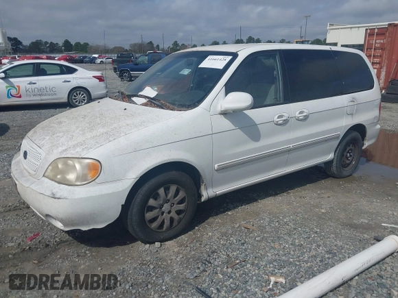 2005 Kia Sedona LX with VIN KNDUP132856700868, listed as a IAAI auction lot 41661428 with 229,142 mi miles. Bid and sale history available at carsss.com. Image 2.