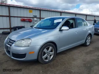 2009 Volkswagen Jetta Sedan SE with VIN 3VWRZ71K39M090645, listed as a IAAI auction lot 41999413 with 244,687 mi miles. Bid and sale history available at carsss.com. Image 2.