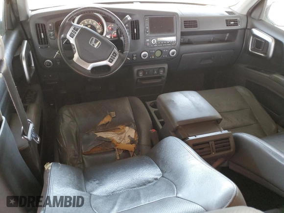 2007 Honda Ridgeline RTL z VIN 2HJYK16517H545034, wystawiony jako Copart lot #59819385 z przebiegiem 258 928 mil mil oraz Czysty tytuł • Clean title. Historia ofert i sprzedaży dostępna na DreamBid. Obrazek 8.