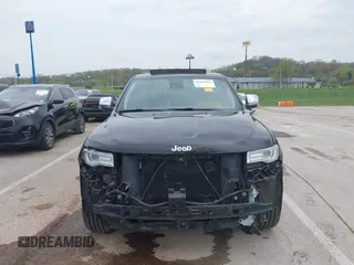 2015 Jeep Grand Cherokee Summit z VIN 1C4RJFJT0FC674494, wystawiony jako IAAI lot #42056835 z przebiegiem 143 969 mil mil oraz . Historia ofert i sprzedaży dostępna na DreamBid. Obrazek 13.