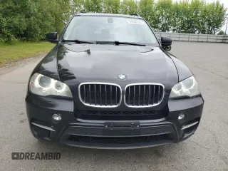 2012 BMW X5 35d with VIN 5UXZW0C54CL671377, listed as a Copart auction lot 60936395 with 105,903 mi miles and Salvage title. Bid and sale history available at DreamBid. Image 5.