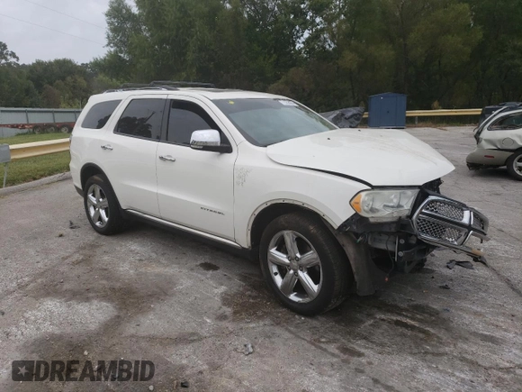 2011 Dodge Durango Citadel with VIN 1D4RD5GG4BC711295, listed as a Copart auction lot 71058884 with 208,639 mi miles and Salvage title. Bid and sale history available at DreamBid. Image 4.