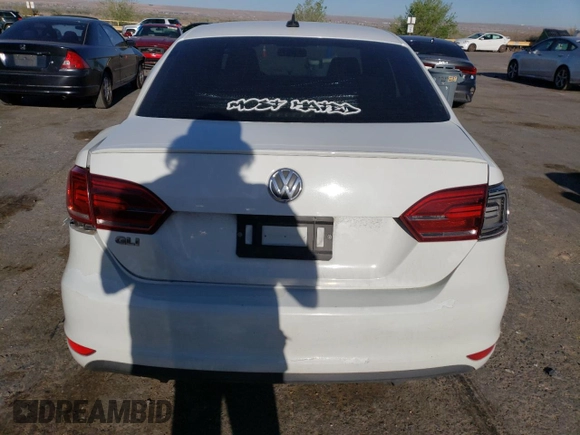 2014 Volkswagen Jetta GLI with VIN 3VW4T7AJ8EM287825, listed as a Copart auction lot 61809114 with 123,305 mi miles and Salvage title. Bid and sale history available at DreamBid. Image 6.