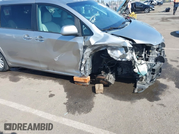 2011 Toyota Sienna XLE AAS with VIN 5TDYK3DC8BS156127, listed as a IAAI auction lot 42103980 with 129,851 mi miles. Bid and sale history available at carsss.com. Image 18.