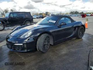 2014 Porsche Boxster with VIN WP0CA2A83ES121319, listed as a Copart auction lot 86530604 with 58,063 mi miles and Salvage Title. Bid and sale history available at carsss.com. Image 1.