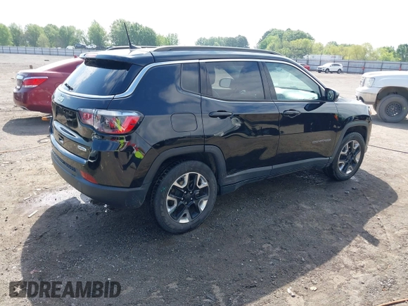 2021 Jeep Compass Altitude with VIN 3C4NJCBB0MT502423, listed as a IAAI auction lot 42006742 with 63,418 mi miles. Bid and sale history available at carsss.com. Image 4.
