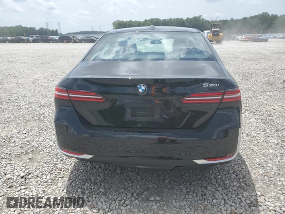 2024 BMW 5 Series 530i with VIN WBA43FJ09RCR05243, listed as a Copart auction lot 61690705 with 34,450 mi miles and Salvage title. Bid and sale history available at DreamBid. Image 6.